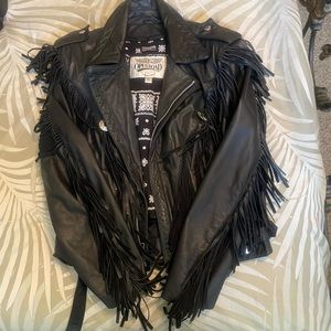 Fringed leather coat with thinsulate lining. Black with silver accents.